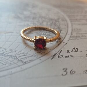 Gold Ring with Vibrant Red Gemstone